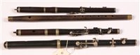 Lot 31 - An ebony flute by Henry Potter London dated...