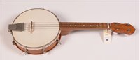 Lot 26 - Continental banjolele with a laminated beech...