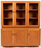 Lot 1082 - Ercol: a Windsor pattern dresser cabinet sideboard.