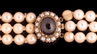 Lot 763 - Three strand pearl necklace