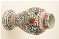 Lot 3 - An 18th Century Chinese writhen baluster vase and cover