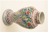 Lot 3 - An 18th Century Chinese writhen baluster vase and cover