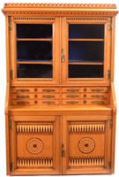 Lot 1024 - A late 19th Century aesthetic movement bookcase cabinet.