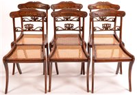 Lot 1003 - Six 19th Century carved beech and brass inlaid chairs.