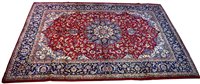 Lot 857 - A Kashan carpet