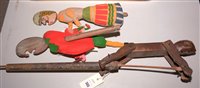 Lot 565 - Two Punch and Judy wooden figures and a carved wooden toy.