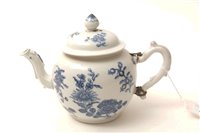 Lot 4 - A mid 18th Century Chinese white porcelain bullet shapewd teapot.