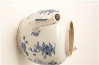 Lot 4 - A mid 18th Century Chinese white porcelain bullet shapewd teapot.