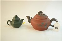 Lot 16 - Two Chinese stoneware teapots and covers.