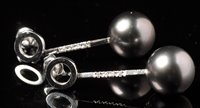 Lot 716 - A pair of Tahitian black pearl and diamond...