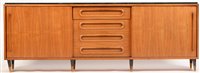 Lot 763 - A mid 20th Century rosewood sideboard.