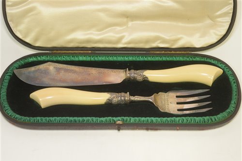 Lot 610 - Silver and ivory fish servers
