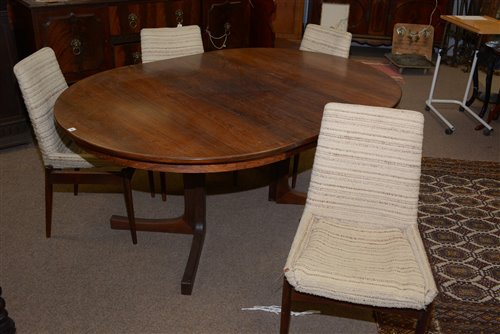 Lot 765 - A rosewood dining table and four chairs circa 1960's