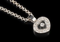 Lot 767 - A Chopard Happy Diamond's heart-shaped pendant