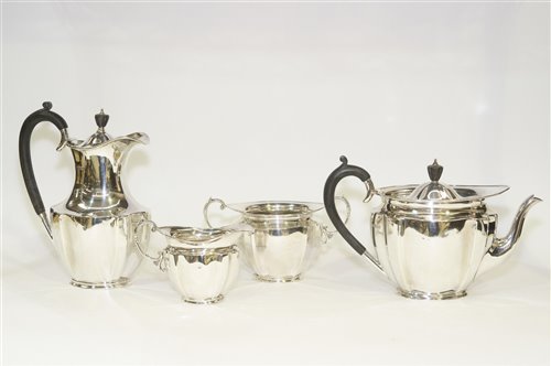 Lot 554 - George V silver four piece tea service