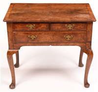 Lot 950 - An early Georgian lowboy.