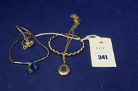 Lot 341 - Yellow metal bangle, locket, necklace