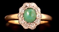 Lot 755 - Turquoise and diamond cluster ring.