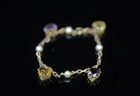 Lot 772 - Pearl and gem-stone bracelet