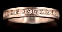 Lot 851 - Diamond half hoop eternity ring