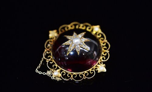 Lot 852 - Garnet, diamond and pearl brooch