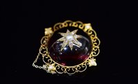 Lot 852 - Garnet, diamond and pearl brooch