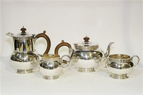 Lot 557 - A George V four-piece silver tea service