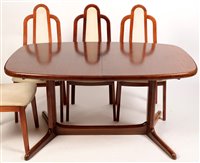 Lot 1127 - A Danish dining table and eight chairs.