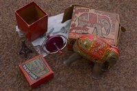 Lot 552 - Tinplate model of 'Jumbo' by Minic Tri-ang Toys, and a Progress gyroscope top.