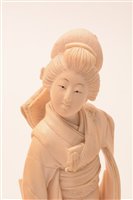 Lot 85 - A Japanese carved ivory figure