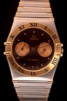 Lot 668 - Omega Constellation: A 18ct gold & stainless steel quartz wristwatch