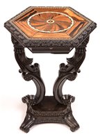 Lot 967 - A 19th Century Singhalese carved ebony and calamander specimen occasional table.
