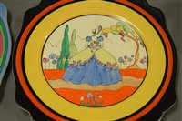 Lot 1193 - Two hand painted Clarice Cliff plates from bizarre