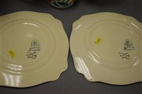 Lot 1193 - Two hand painted Clarice Cliff plates from bizarre