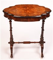 Lot 977 - A Victorian work table.