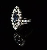 Lot 849 - Sapphire and diamond ring