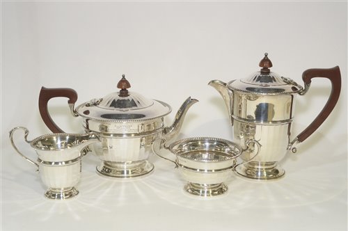 Lot 566 - A George V silver four piece tea service