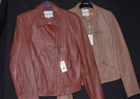 Lot 312 - Two Reiss tan leather jackets.