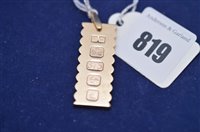 Lot 819 - Gold ingot pendant
