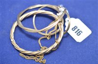 Lot 816 - A 9ct yellow gold baton link necklace, bangle and chain