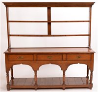 Lot 978 - A Georgian style oak dresser