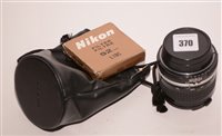 Lot 370 - A Nikkor 24mm f-2.8 wide angle lens