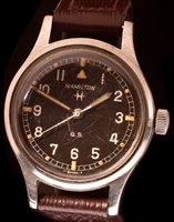 Lot 694 - A stainless steel military style wristwatch.
