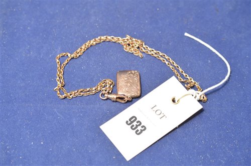 Lot 933 - A yellow metal locket pendant