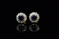 Lot 754 - Pair of sapphire and diamond earrings