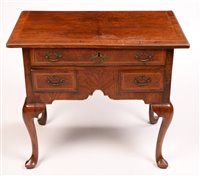 Lot 1017 - An early Georgian lowboy.