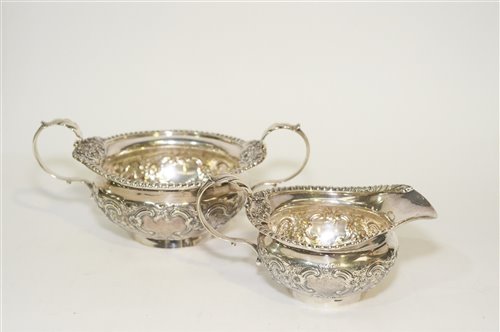 Lot 570 - A silver milk jug and sugar bowl