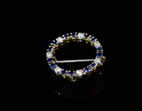 Lot 797 - Sapphire and diamond brooch