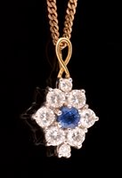 Lot 835 - Sapphire and diamond pendant