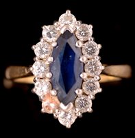Lot 811 - Sapphire and diamond ring
